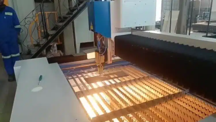 Laser cutting during on-site commissioning (video still)
